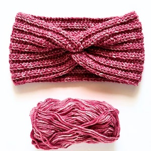 May include: A pink and white yarn headband with a twisted knot design. A ball of pink and white yarn is also shown.