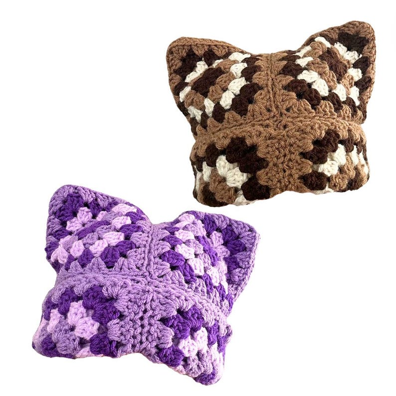 May include: Two crocheted pillow covers, one in brown and white and one in purple and pink. Both have a square pattern.