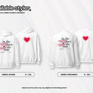 May include: White unisex hoodie and crewneck sweatshirt with a red heart and the text "in the right place at the right time." Available in sizes S-3XL.