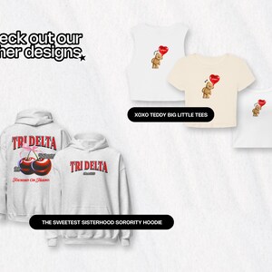 May include: A set of white hoodies and t-shirts featuring a sorority logo and cherry design. The hoodies have the text "TRI DELTA" and "Sweetest Sisterhood Sorority" printed on them. The t-shirts have a teddy bear design with a heart balloon. The text "XOXO Teddy Big Little Tees" is printed below the t-shirts.