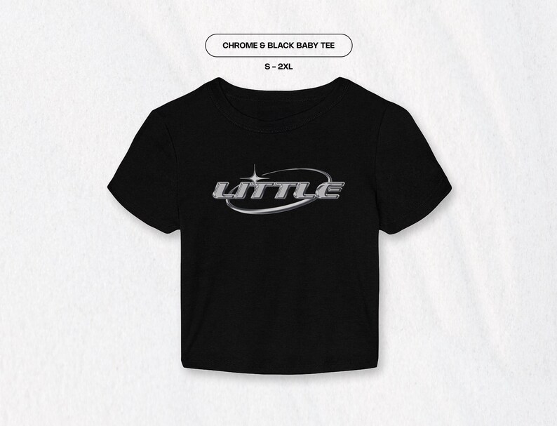 May include: Black baby tee with a silver chrome graphic that says "LITTLE" in a rounded oval shape.