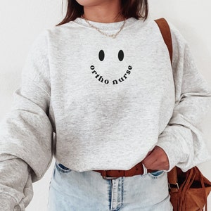 Ortho Nurse Sweatshirt Orthopedic Nurse Crewneck Nursing School Grad Gift Ortho Nurse Shirt Orthopedic RN Pullover Trendy Ortho Nurse Gift