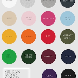 May include: Color chart for Gildan 18000 t-shirts. The chart shows 16 different colors, including white, ash, sport grey, dark heather, sand, light pink, heliconia, light blue, gold, orange, red, military green, Irish green, forest green, maroon, navy, purple, and black.