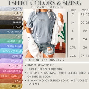 May include: A chart showing t-shirt colours and sizing. The chart lists 17 colours, including white, ivory, khaki, pepper, black, blue jean, bay, island reef, periwinkle, lagoon blue, violet, orchid, blossom, crunchberry, bright salmon, yam, and butter. The chart also lists sizes S, M, L, XL, 2XL, and 3XL with corresponding width and length measurements in inches. The chart also includes information about the t-shirt fit, fabric, and sizing suggestions. The text "COMFORT COLORS C1717" is visible at the bottom of the chart.