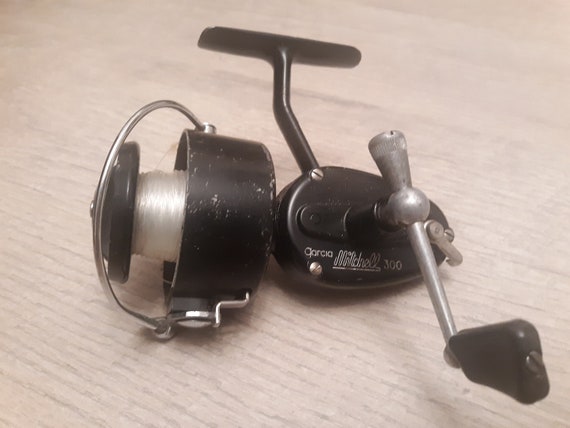 FISHING ROD WITH MITCHELL 300 REEL - sporting goods - by owner