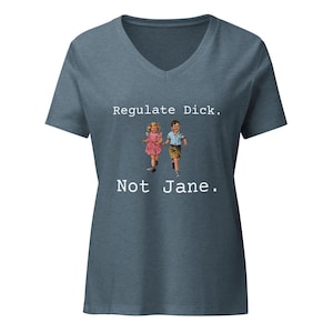 May include: A blue V-neck t-shirt with the text "Regulate Dick. Not Jane." printed in white. The shirt features a vintage illustration of a girl and boy running.