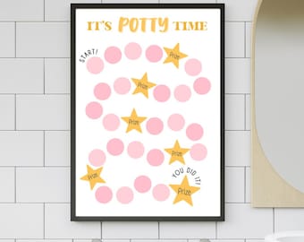 Può includere: Un poster bianco con il testo "It's Potty Time" in lettere dorate. Il poster ha un percorso a forma di stella rosa e dorata con la parola "Prize" scritta accanto a ogni stella. Il poster ha anche le parole "Start!" e "You Did It!" in lettere nere.