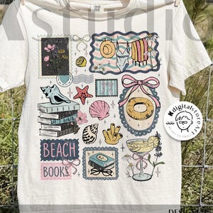 May include: Cream-colored t-shirt featuring a collage of beach-themed illustrations. The design includes seashells, books, a swimsuit, a life preserver, and the words "BEACH BOOKS." The shirt is hanging on a clothesline.