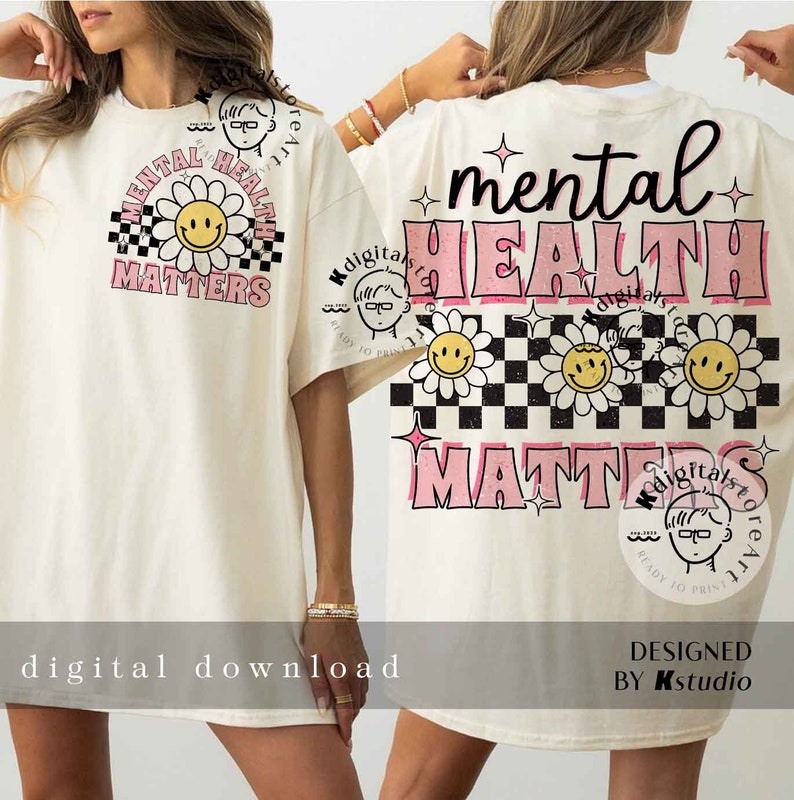 May include: A white t-shirt with a pink and black graphic design that says "mental health matters". The graphic features a checkered pattern, daisies, and smiley faces.