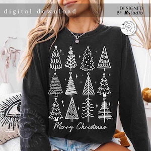 May include: Black long-sleeve sweatshirt featuring a white graphic of various Christmas trees. The text "Merry Christmas" is below the trees. The words "digital download" and "designed by Kstudio" are also visible.