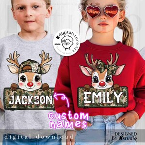 May include: Two children's sweatshirts. One is gray, the other is red. Each features a cartoon reindeer with a red nose and a name on a camouflage sign. The gray sweatshirt says "JACKSON", and the red one says "EMILY". The design is a digital download.
