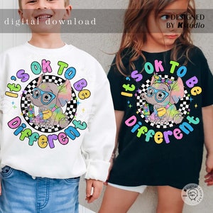 May include: A white and black checkered circle with the text "It's OK to Be Different" in rainbow colors. Inside the circle is a cartoon illustration of a rainbow colored elephant wearing glasses and a bandana.