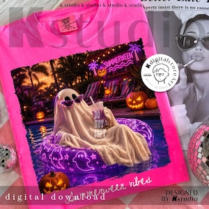 May include: A bright pink t-shirt with a graphic featuring a ghost in sunglasses relaxing in a pool float. The image includes pumpkins, palm trees, and the text "Summerween vibes". The shirt also has the text "Comfort Colors".