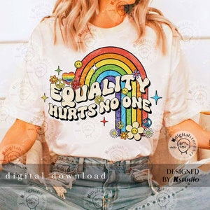 May include: A white t-shirt featuring a rainbow, flowers, and peace signs. The text on the shirt reads "EQUALITY HURTS NO ONE".