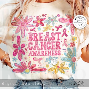 May include: Cream-colored t-shirt with the words "BREAST CANCER AWARENESS" in pink, surrounded by pink, blue, and yellow floral designs and pink ribbons. The words "digital download" are at the bottom.