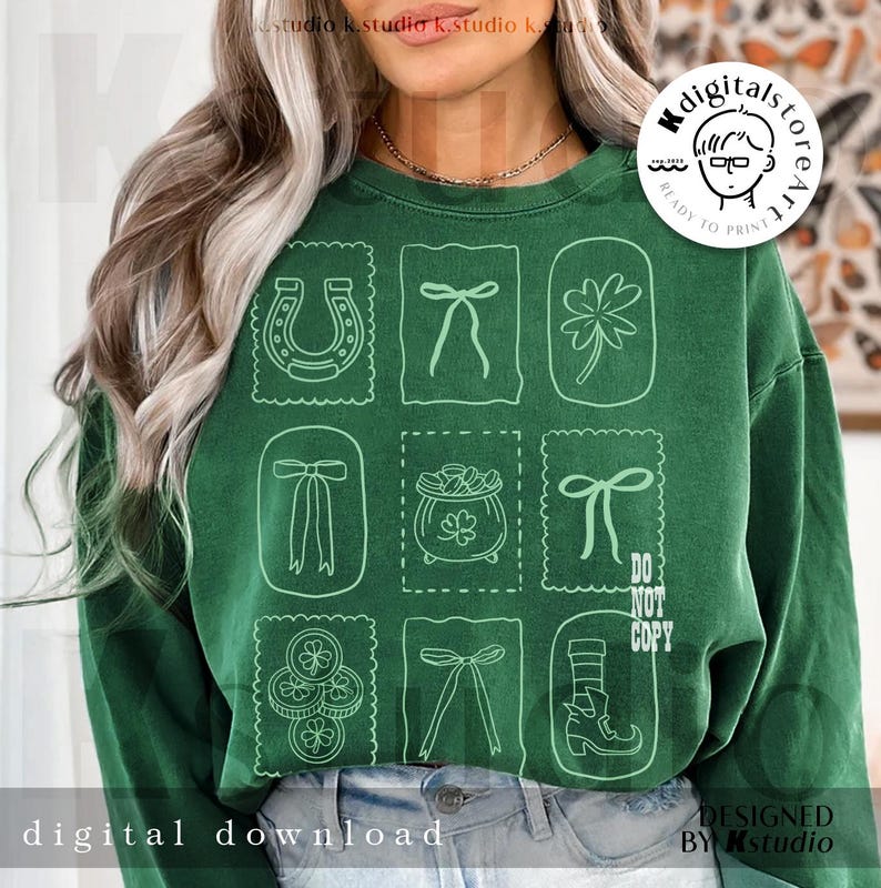 May include: Green sweatshirt with a grid of St. Patrick's Day themed illustrations, including a horseshoe, bows, a four-leaf clover, and a pot of gold. The words "DO NOT COPY" are printed on the design. The words "digital download" are printed at the bottom.
