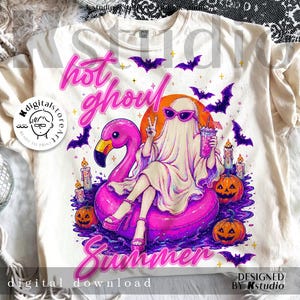 May include: Cream-colored t-shirt featuring a whimsical illustration. A ghost wearing sunglasses sits on a pink flamingo float, holding a drink. The words "hot ghoul summer" are written in pink script, with bats and pumpkins. "Digital download" is also written on the shirt.
