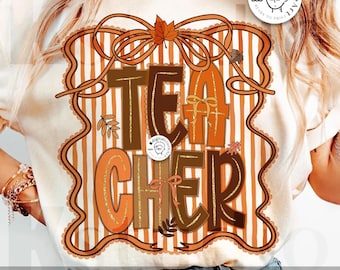May include: Cream-colored t-shirt with the word "TEACHER" in brown and orange letters. The design includes a decorative border, bows, and fall leaves. The words "digital download" and "designed by Kstudio" are also visible.