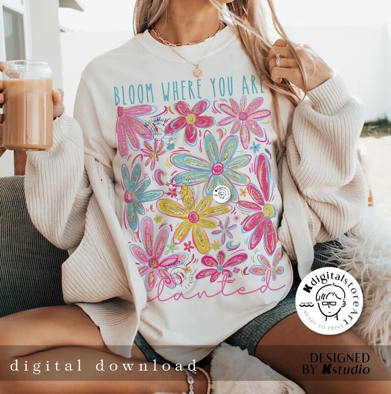 May include: A white t-shirt with a floral design and the text "Bloom Where You Are Planted".