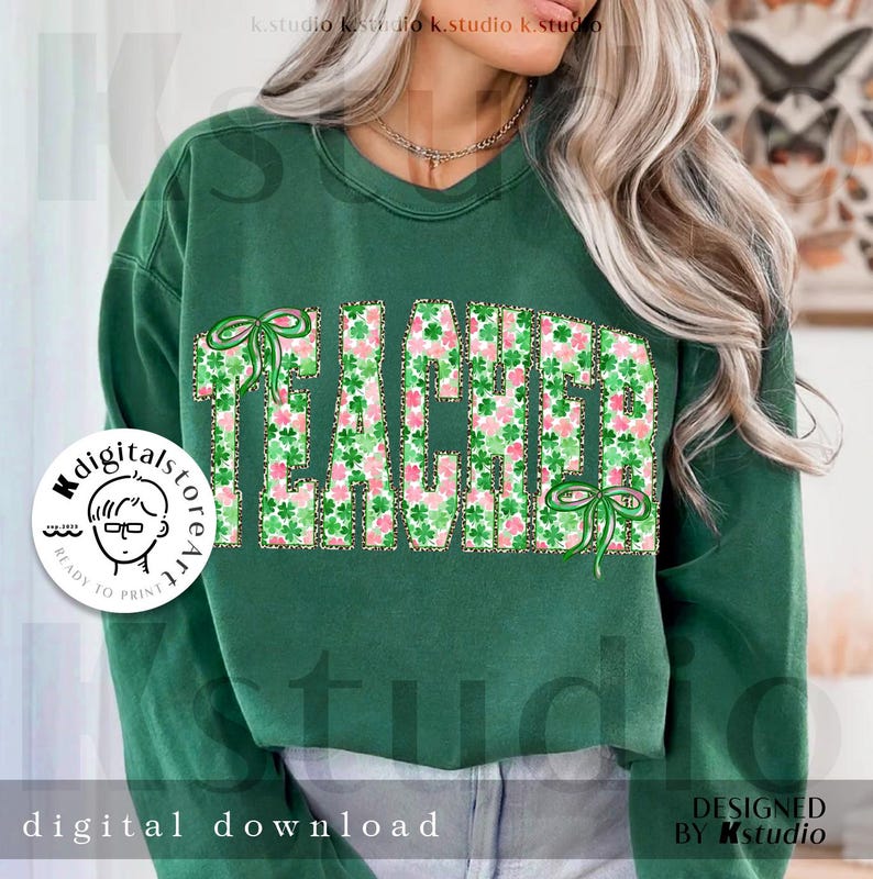 May include: Green sweatshirt with the word "TEACHER" in large, block letters. The letters are filled with a pattern of pink and green shamrocks and accented with green bows. The words "digital download" are at the bottom.