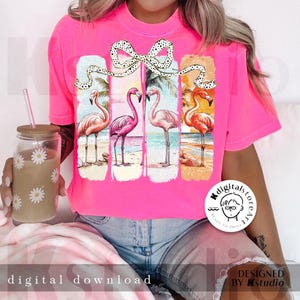 May include: Bright pink t-shirt featuring a flamingo design. The design includes four rectangular panels with flamingo illustrations on a beach scene, tied together with a dotted ribbon. The words "digital download" are at the bottom.