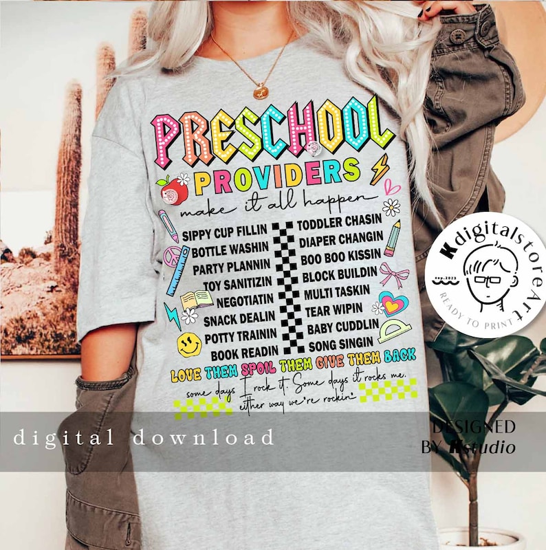 May include: A gray t-shirt with the text "PRESCHOOL PROVIDERS make it all happen" in colorful letters. The shirt features a list of tasks preschool providers do, such as "sippy cup fillin", "toddler chasin", "diaper changin", "boo boo kissin", "block buildin", "multi taskin", "tear wipin", "baby cuddlin", "song singin", and "book readin". The text "LOVE THEM SPOIL THEM GIVE THEM BACK" is written in a heart shape. The shirt also includes the text "Some days I rock it. Some days it rocks me. Either way we're rockin'" in a checkered pattern.