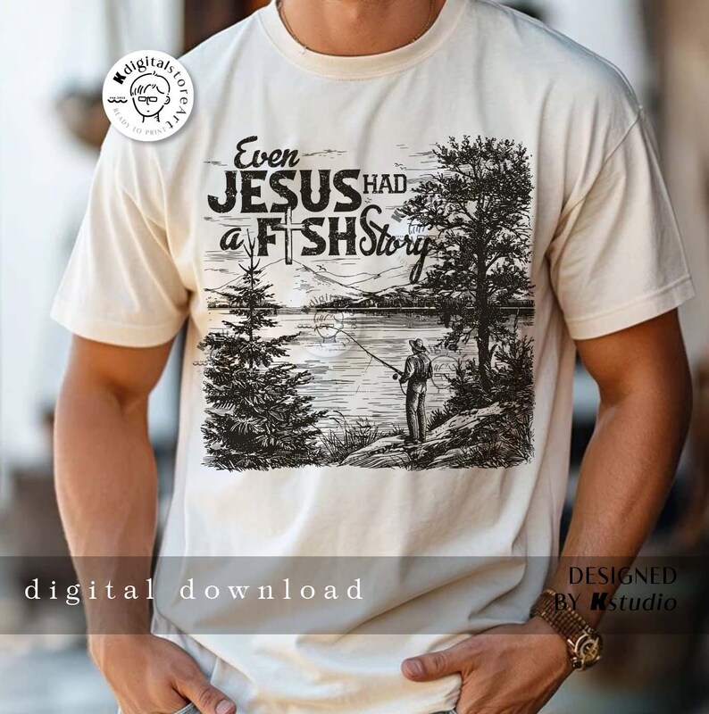 May include: A white t-shirt with a black and white illustration of a person fishing in a lake. The text "Even Jesus Had a Fish Story" is printed on the shirt.