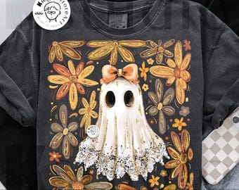 May include: Dark gray sweatshirt featuring a whimsical ghost design with a peach bow and floral accents. The ghost is surrounded by orange and yellow flowers. The words "digital download" are at the bottom. The design is by Kstudio.