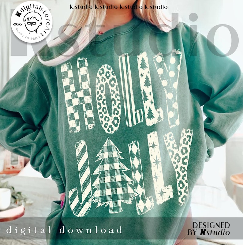 May include: A dark green crewneck sweatshirt featuring the text HOLLY JOLLY in large, cream-colored letters. Each letter displays a unique pattern, including checkered, leopard print, striped, polka dot, and Christmas tree motifs.