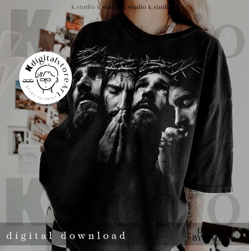May include: Black t-shirt featuring a grayscale graphic of four faces, each wearing a crown of thorns. The faces are in various states of contemplation. The words "digital download" are printed at the bottom. The shirt is part of a digital art collection.
