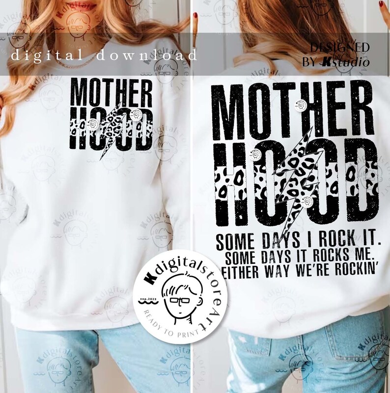 May include: White sweatshirt with black text that reads "MOTHERHOOD" with a leopard print lightning bolt. The text below reads "SOME DAYS I ROCK IT. SOME DAYS IT ROCKS ME. EITHER WAY WE'RE ROCKIN'."