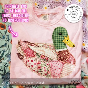 May include: A light pink t-shirt featuring a patchwork duck design. The duck has a green checkered head, a yellow beak, and a body made of various floral and patterned fabrics. The shirt includes the text "PRINTABLE PNG" and "digital download".