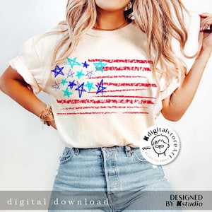 May include: A white t-shirt with a red, white, and blue American flag design. The flag is drawn in a childlike style with blue and turquoise stars. The text "Digitalstoreart" is on a white circle with a cartoon image of a person wearing glasses. The text "Ready to Print" is below the image.