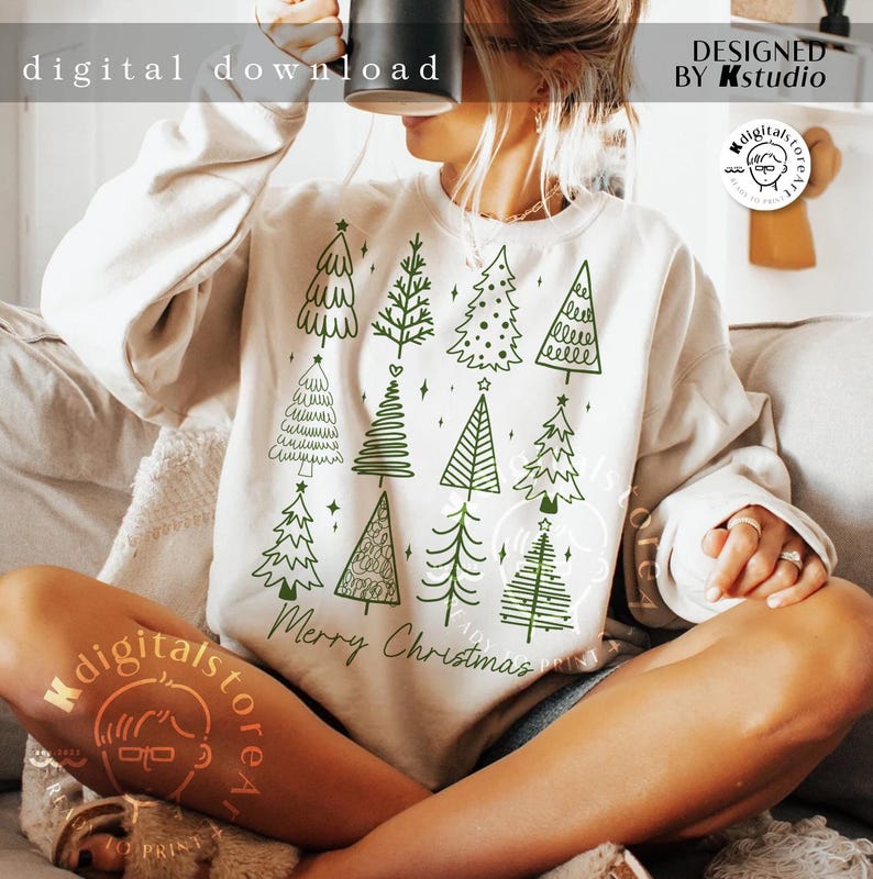 May include: A cream-colored sweatshirt featuring a collection of green Christmas tree designs. The phrase "Merry Christmas" is printed in a script font below the trees. The words "digital download" are at the top.