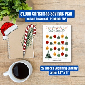 May include: A printable Christmas savings plan with a festive design. The plan includes a chart with ornaments, a Christmas tree, and the text "£1,000 Christmas Savings Plan." The image also features a Santa hat, candy cane, and a notepad.