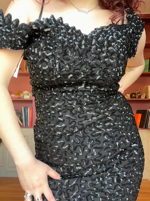 phenomenal vintage 1950s Black sequin knee length wiggle dress with sweetheart neckline phenomenal vintage 1950s Black sequin knee length wiggle dress with sweetheart neckline