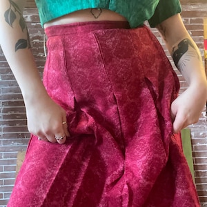 stylish vintage 1960s bright pink pleated knee length knit wool skirt with knit in rose pattern
