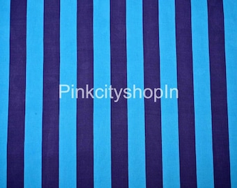 May include: Blue and purple striped fabric. The fabric has a woven texture.