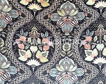 May include: Black fabric with a repeating pattern of stylized flowers and leaves in shades of pink, green, and gold. The pattern is intricate and detailed, with a vintage feel.