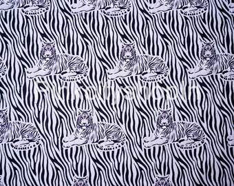 May include: White tigers with black stripes are repeated on a black and white zebra print background.