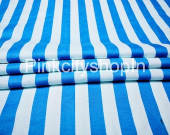 May include: Blue and white striped fabric with a smooth texture. The fabric is folded in thirds, showing the pattern.