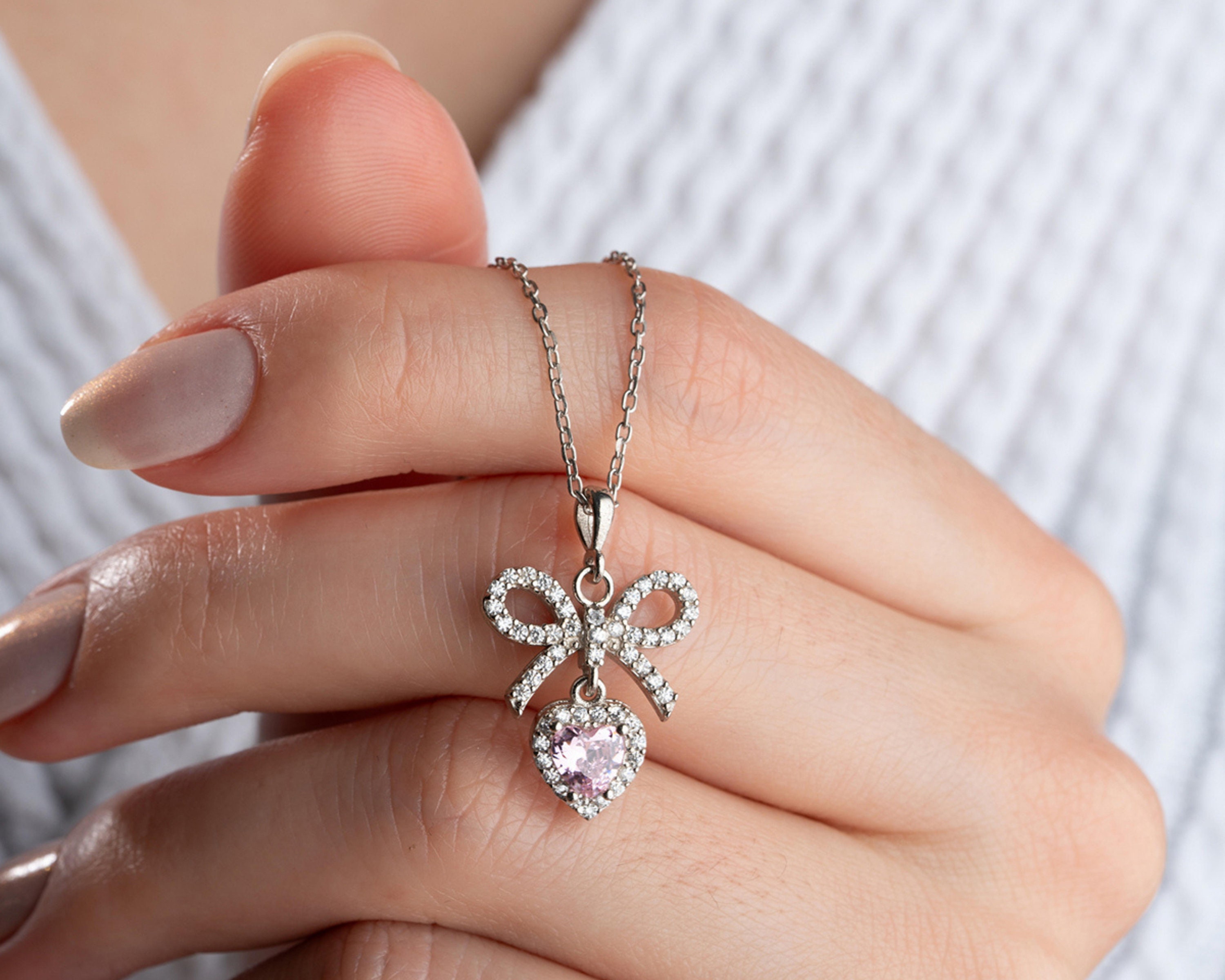 Brilliant bow charm hot sale