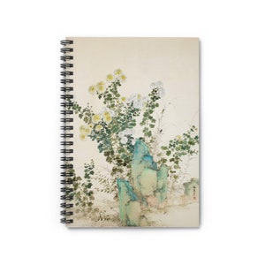 May include: Spiral-bound notebook featuring a traditional Asian-style painting. The artwork depicts white and yellow flowers, green foliage, and turquoise-colored rock formations. The notebook has a cream-colored background and a black spiral binding.