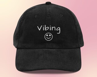 Vibing corduroy cap with cute clip art