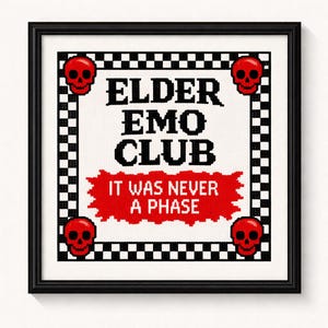 May include: A framed cross-stitch featuring the text "ELDER EMO CLUB" and "IT WAS NEVER A PHASE" in black and red. Four red skulls are placed in each corner. The border is a black and white checkerboard pattern.