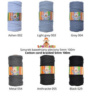 May include: Six spools of braided cotton cord in shades of grey and black are displayed. The colours are labelled as "Ashen 002", "Light grey 003", and "Black 029". The cord is 5mm thick and 100m long. The brand name "ŁOWICZANKA" is visible on the labels.