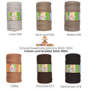 May include: Six spools of braided cotton cord in shades like linen, dark sand, and dark brown. Each spool is labelled with a colour name and number, and wrapped with a colourful band featuring a logo and text.