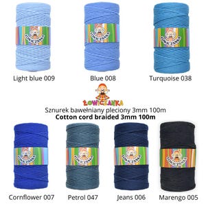 May include: Eight spools of braided cotton cord in shades of blue, turquoise, and black. Each spool is labelled with a colour name and number, such as "Light blue 009," "Blue 008," and "Turquoise 038." The text "Cotton cord braided 3mm 100m" is also visible.