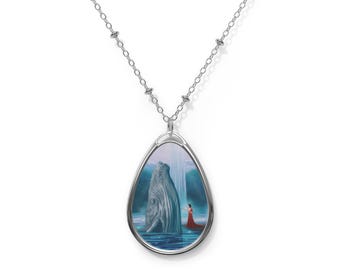 Puede incluir: Collar plateado con un colgante en forma de lágrima. El colgante presenta una pintura de una ballena emergiendo del agua, con una persona con un vestido rojo. El fondo muestra una cascada y un cielo azul.