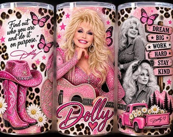 May include: A cylindrical tumbler featuring a pink and leopard print design with images of Dolly Parton, a pink cowboy hat and boots, a pink truck, butterflies, and daisies. Text includes: Find out who you are and do it on purpose, Dolly, and Dream Big Work Hard Stay Kind.